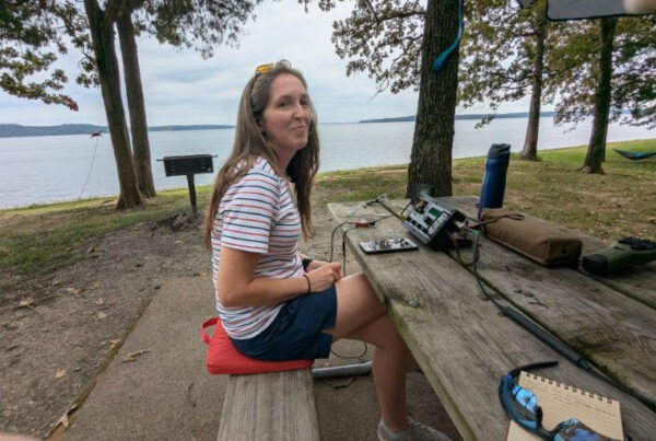 young woman outside with CW equipment