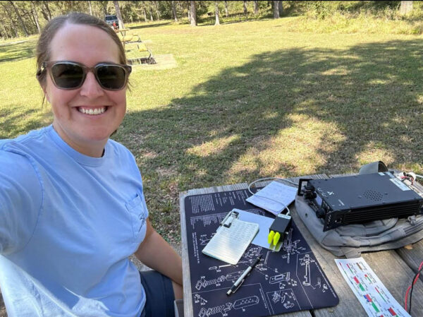 woman outside with CW equipment