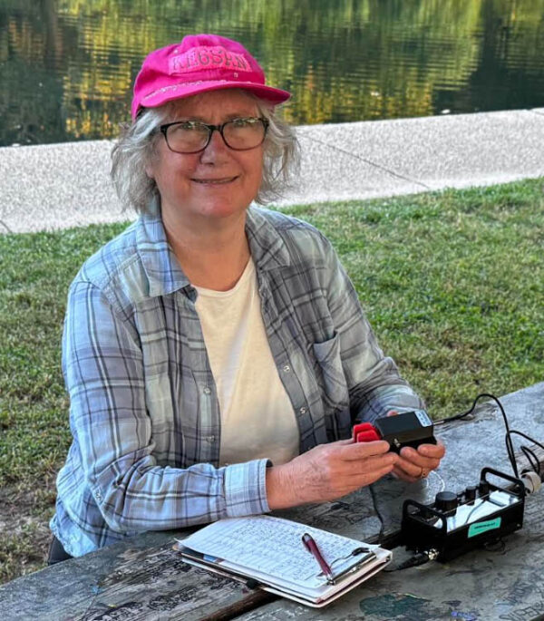 woman with CW equipment outside